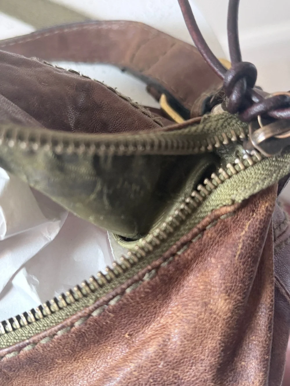 Hyper Distressed Fossil Vintage Bag.
